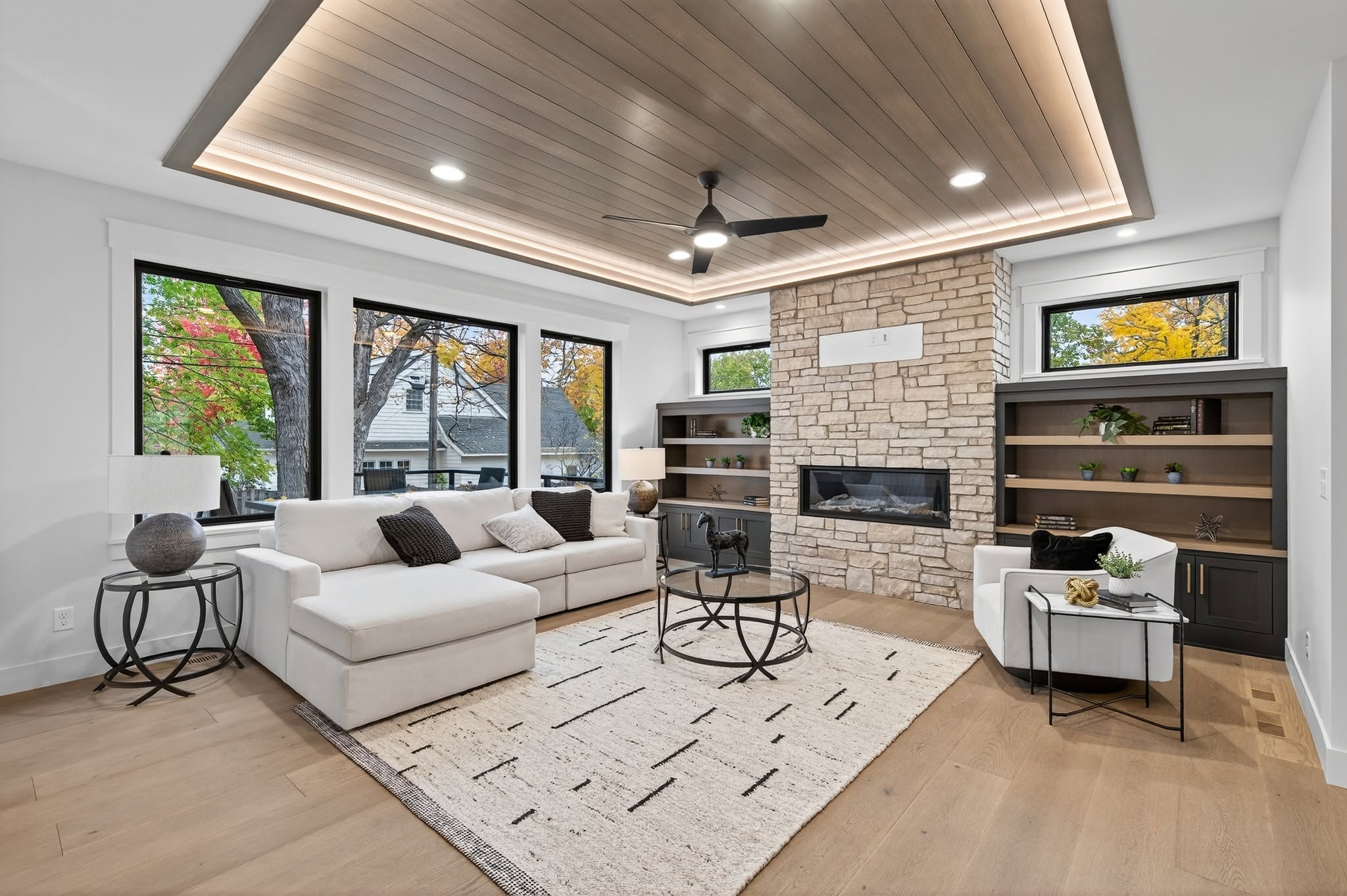 Modern residential interior with staircase and fireplace