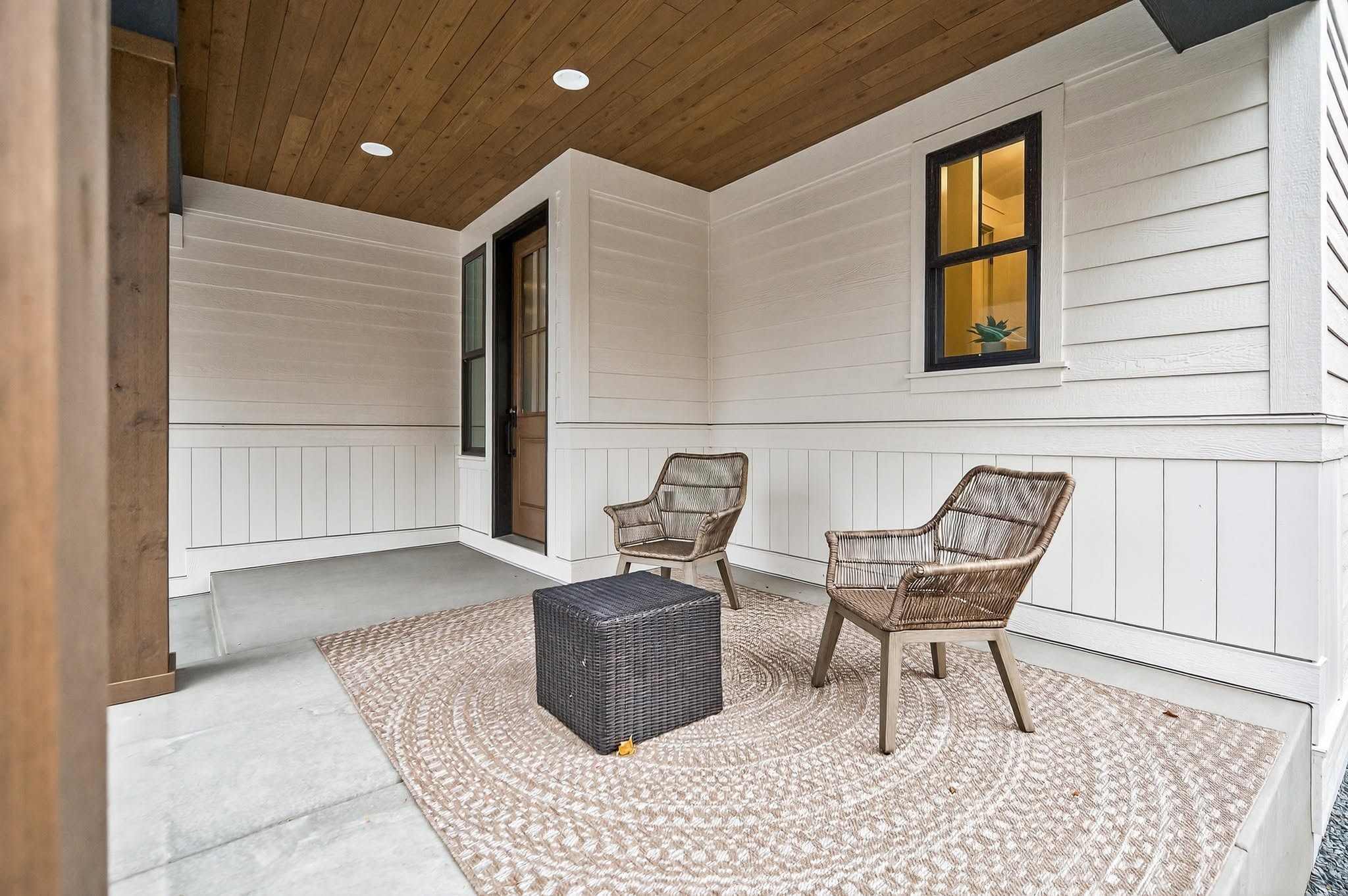 Front porch with wicker chairs