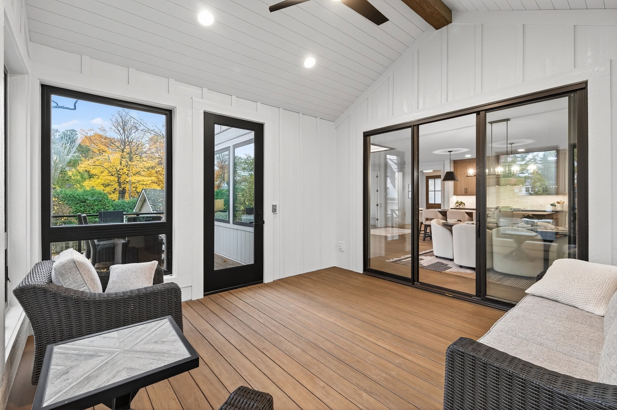 Screened porch with sliding doors to kitchen